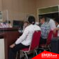 Teks foto: Direktur LBH Medan, Irvan Sahputra mendampingi Eva Meliani saat membuat laporan ke Mapolda Sumut, Senin (8/7/2024).(ist)